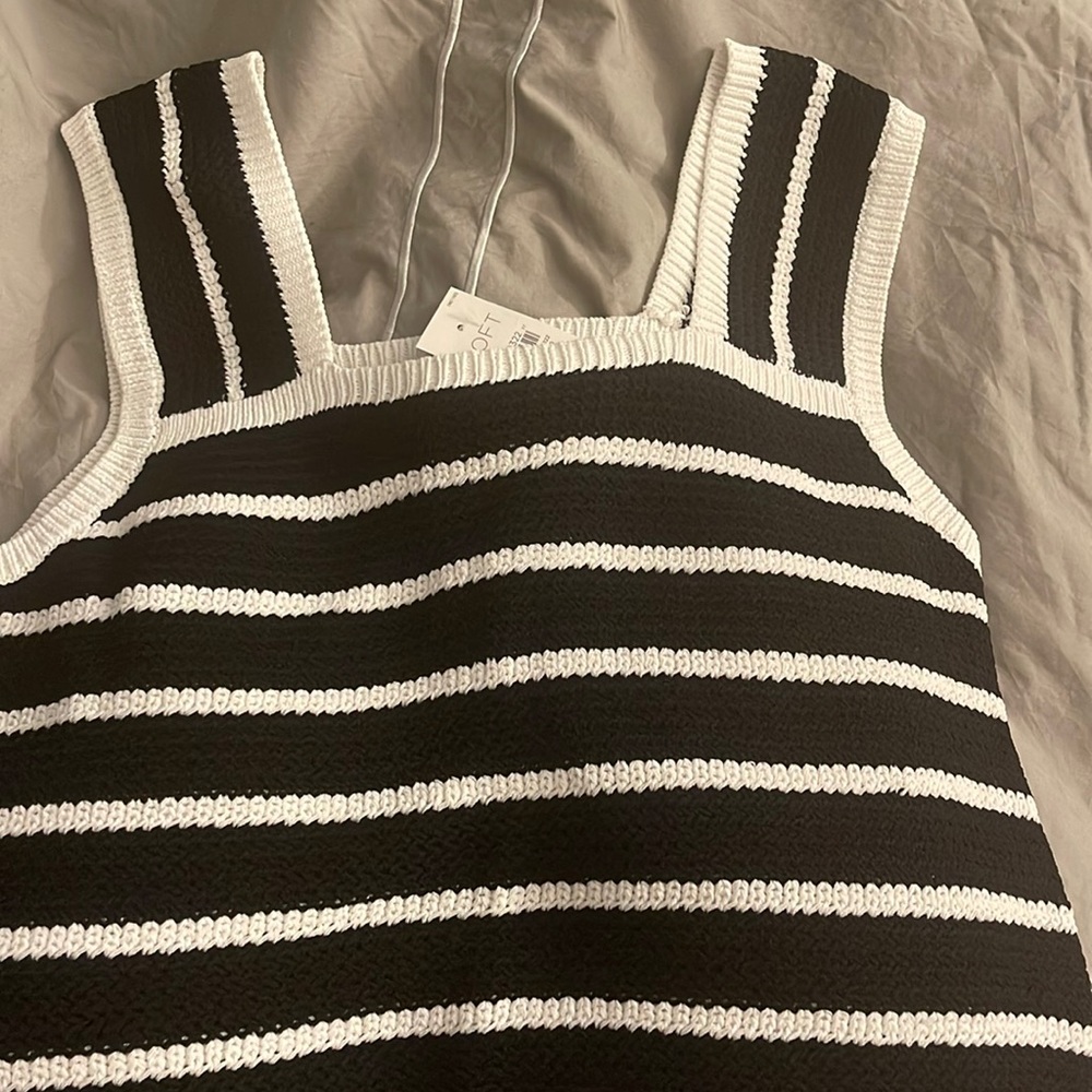 Loft top with tags